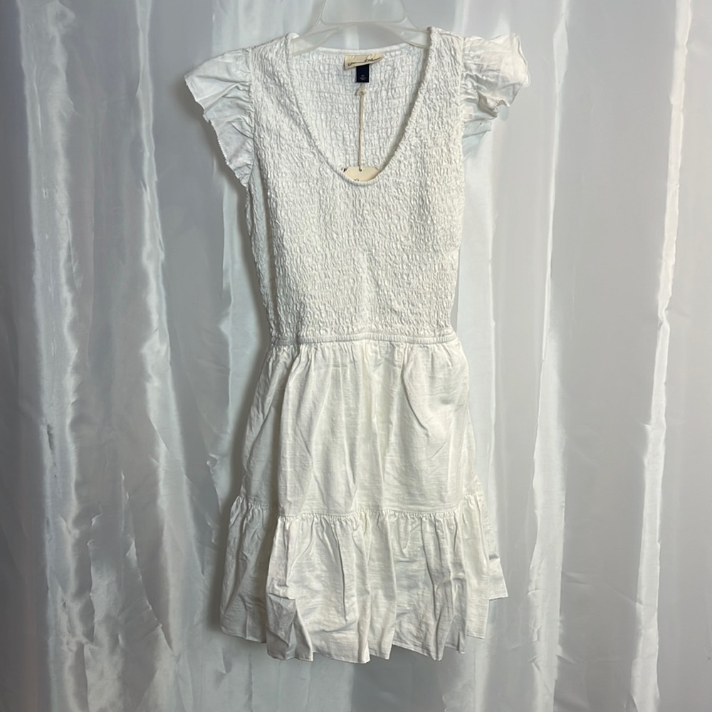 Women’s adorable white dress with side pockets  2225